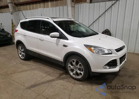 2016 Ford Escape Titanium z USA, uszkodzony, nr VIN 1FMCU9J93GUC79638